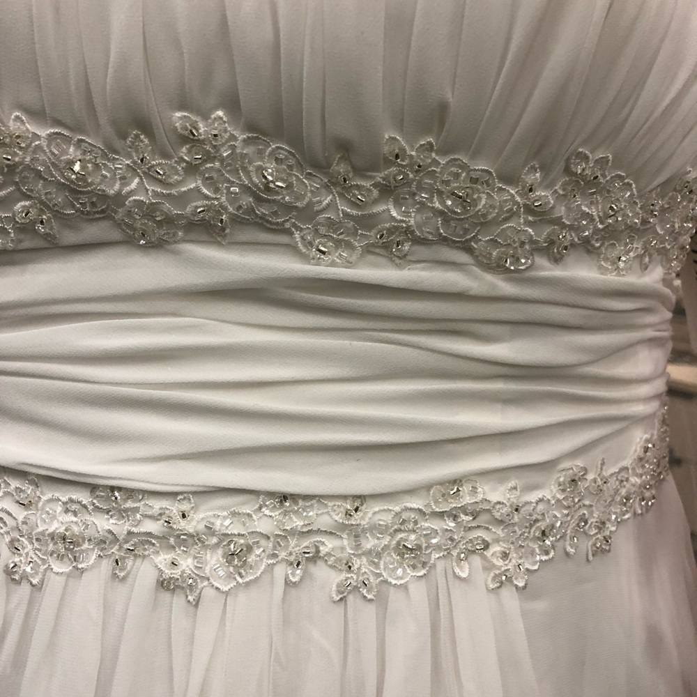 Wedding Dress - brand new, never worn and unaltered.